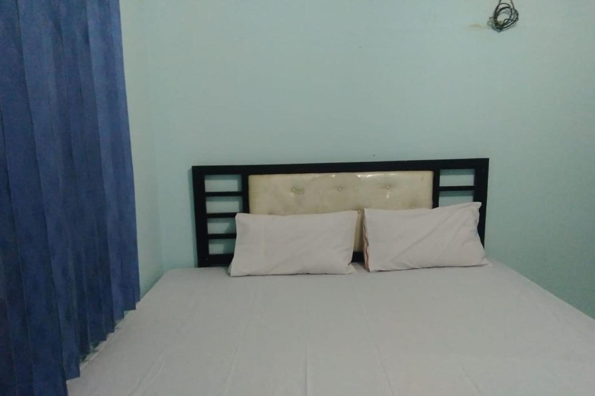 Oyo 90766 Gardenia Boarding House Hotel Пурвокерто Екстериор снимка